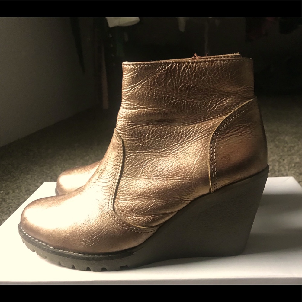 Distressed gold leather boots
